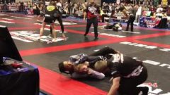 Chocolate Whore Chokes Out Redhead At A Wrestling Tournament
